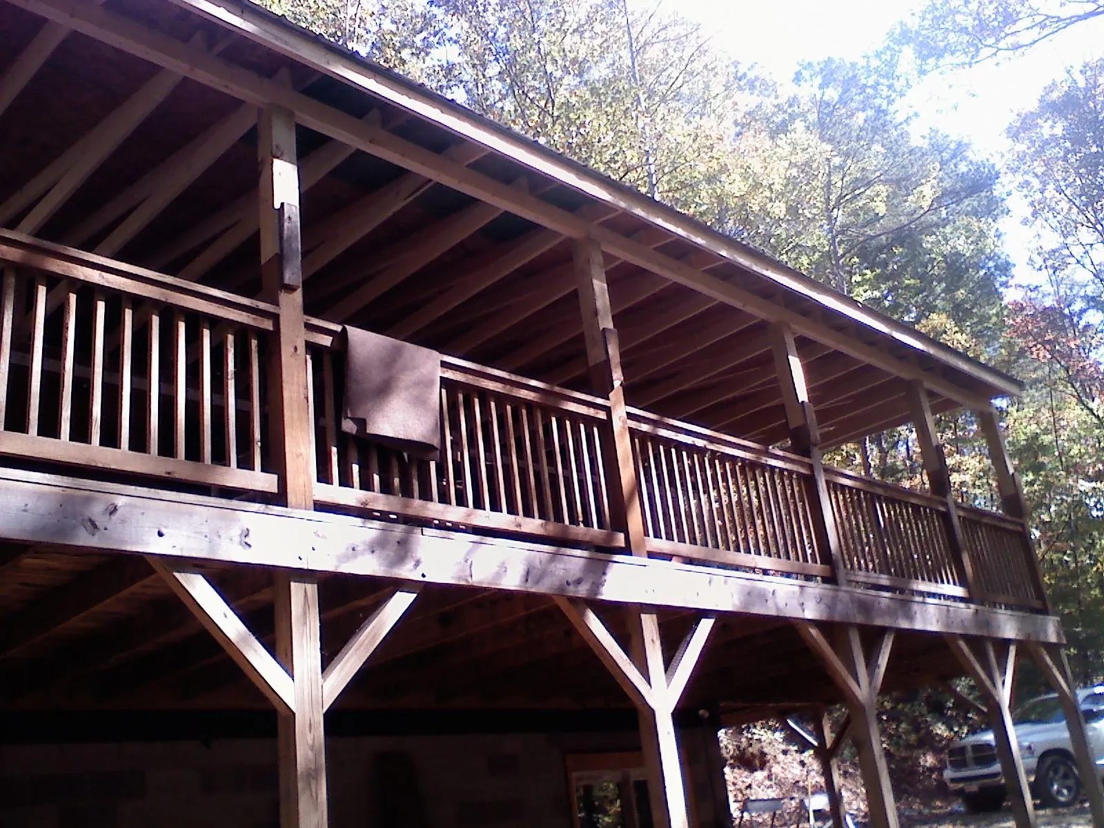 Timber framing under a new elevated porch and deck — Roof Leak Repair in Brockport by Roofing Brothers